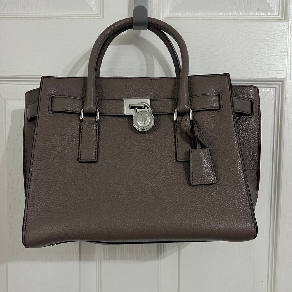 Authentic Michael Kors Satchel bag. Brand New. Never be used